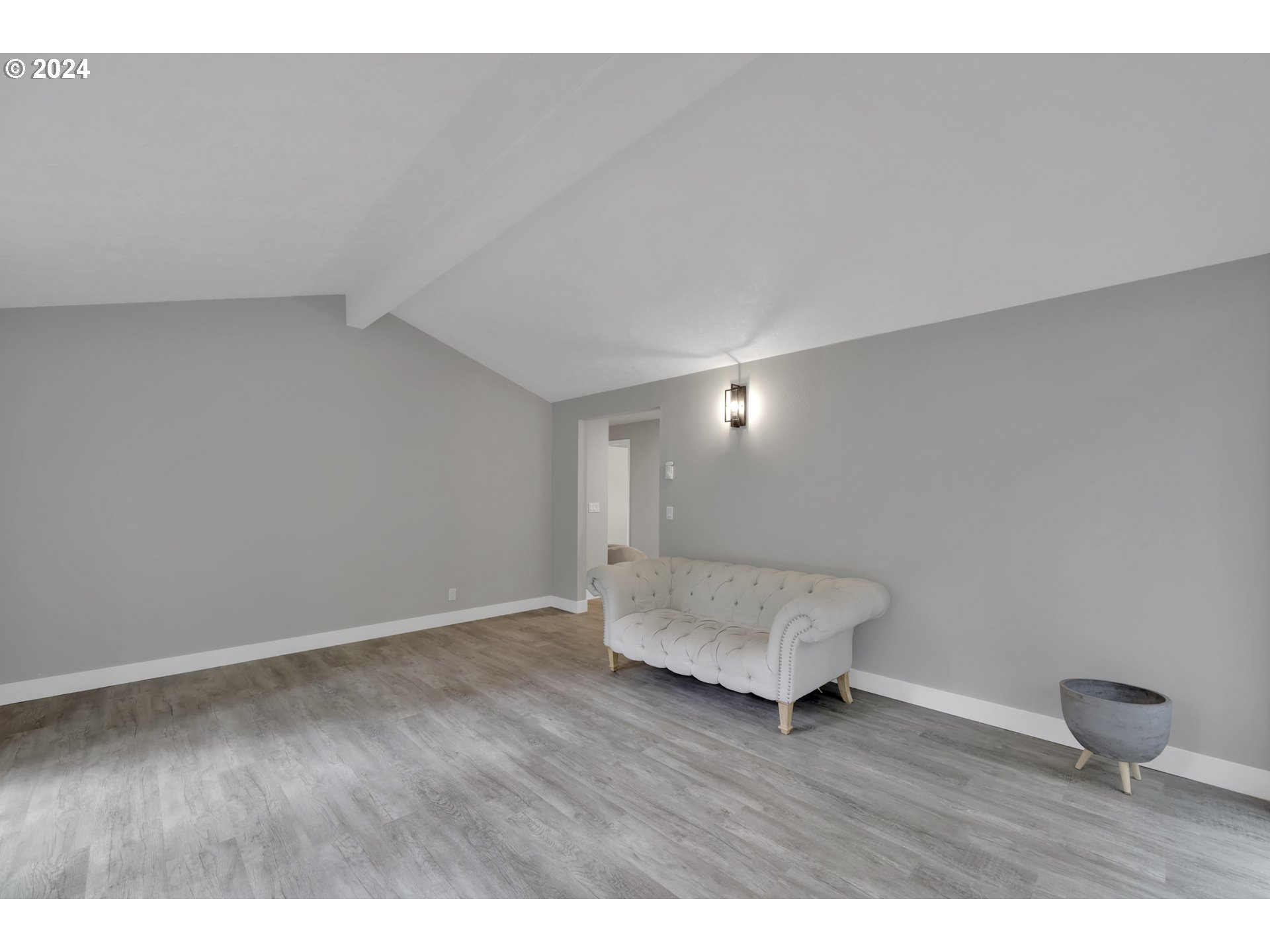 88164 Chita Loop Springfield, OR 97478 - Photo 5 of 48 a view of an empty room and wooden floor