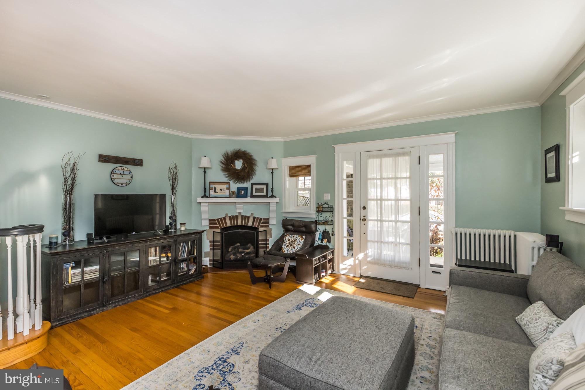 2932 Rising Sun Road Ardmore, PA 19003 - Photo 7 of 48 Living room with Gas Fireplace and gorgeous light