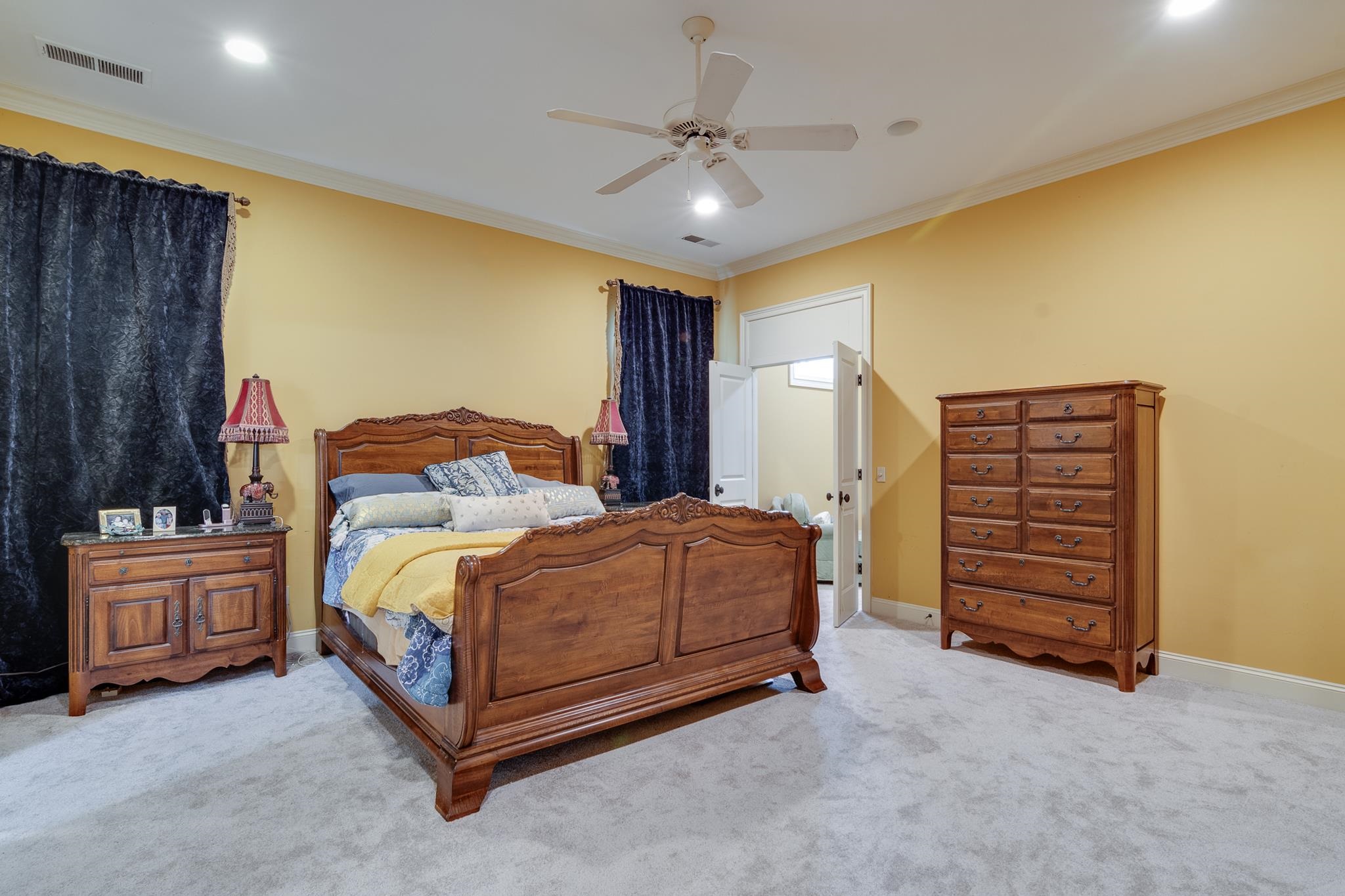 226 North White Station Road Memphis, TN 38117 - Photo 15 of 31 Carpeted bedroom featuring ornamental molding and ceiling fan