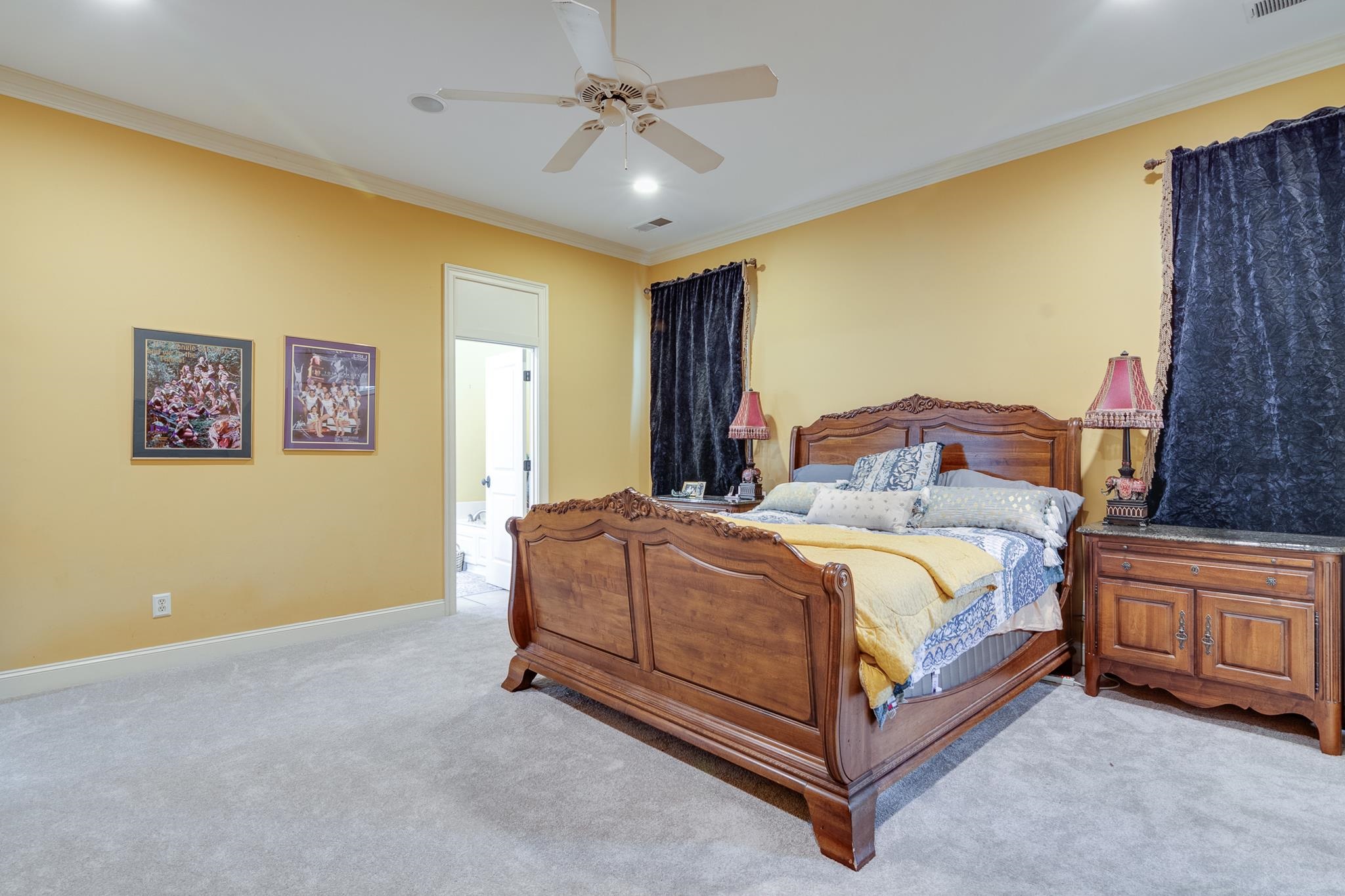 226 North White Station Road Memphis, TN 38117 - Photo 17 of 31 Carpeted bedroom featuring ceiling fan and crown molding