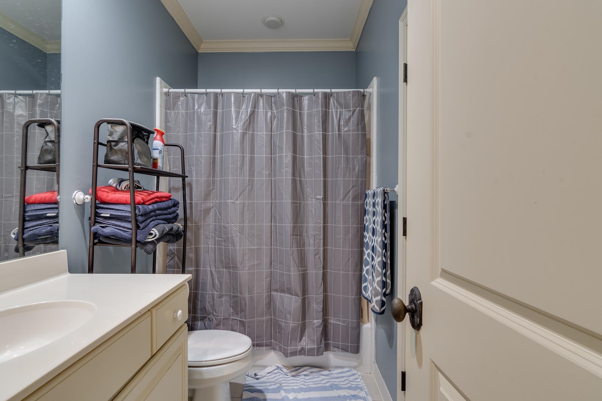 226 North White Station Road Memphis, TN 38117 - Photo 27 of 31 Bathroom featuring vanity, toilet, and crown molding