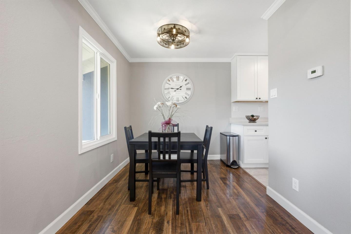 2793 Ruff Court Pinole, CA 94564 - Photo 14 of 53 a view of a dining room with furniture and wooden floor