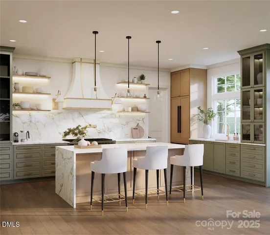 a kitchen with stainless steel appliances kitchen island granite countertop a table chairs and a wooden cabinets