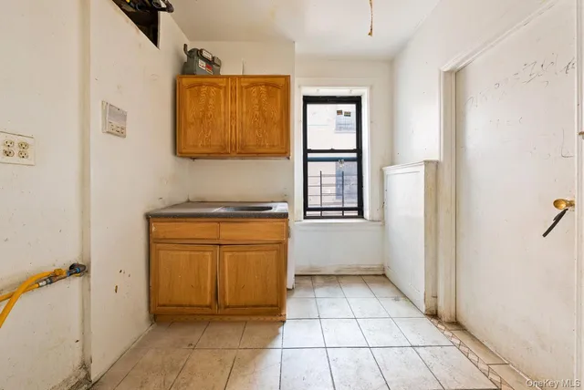 a view of a storage & utility room in a kitchen