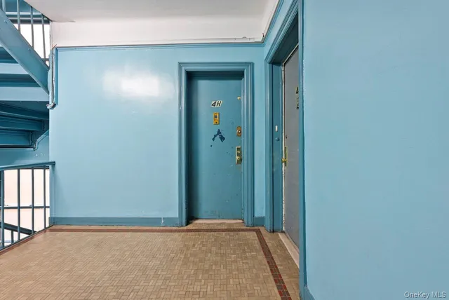 a view of hallway with windows