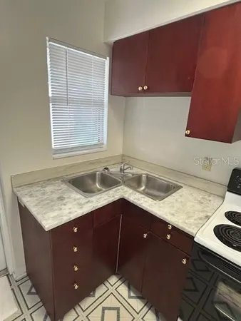 a kitchen with a cabinets and a stove