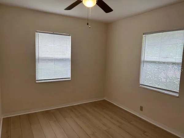 a bathroom with a toilet and a bathtub