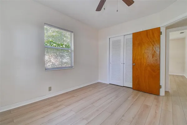 a bathroom with a sink vanity and mirror