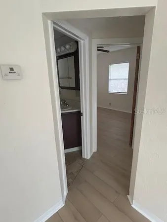 a bathroom with a sink and shower