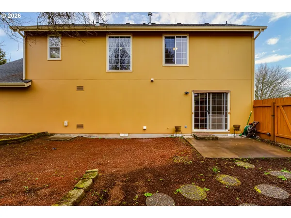 a backyard of a house with lots of green space