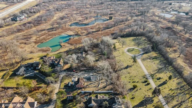 a black and white building with glass windows