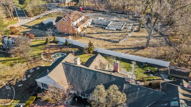 a view of swimming pool with sitting area
