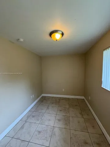 a view of a room with a window