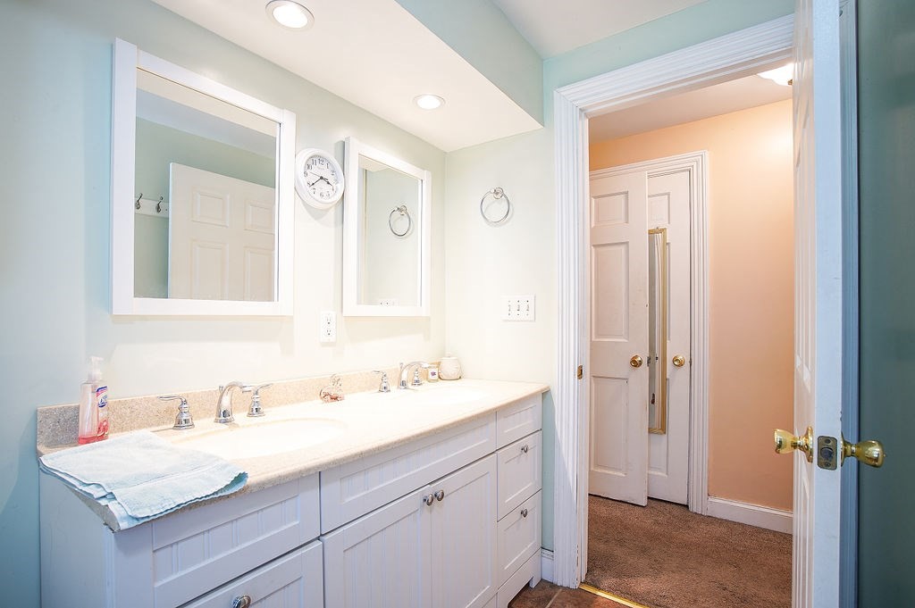 15 Holyoke Road Westfield, MA 01085 - Photo 17 of 41 a bathroom with a sink a vanity and a mirror