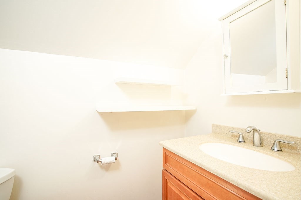 15 Holyoke Road Westfield, MA 01085 - Photo 29 of 41 a bathroom with a sink and a mirror