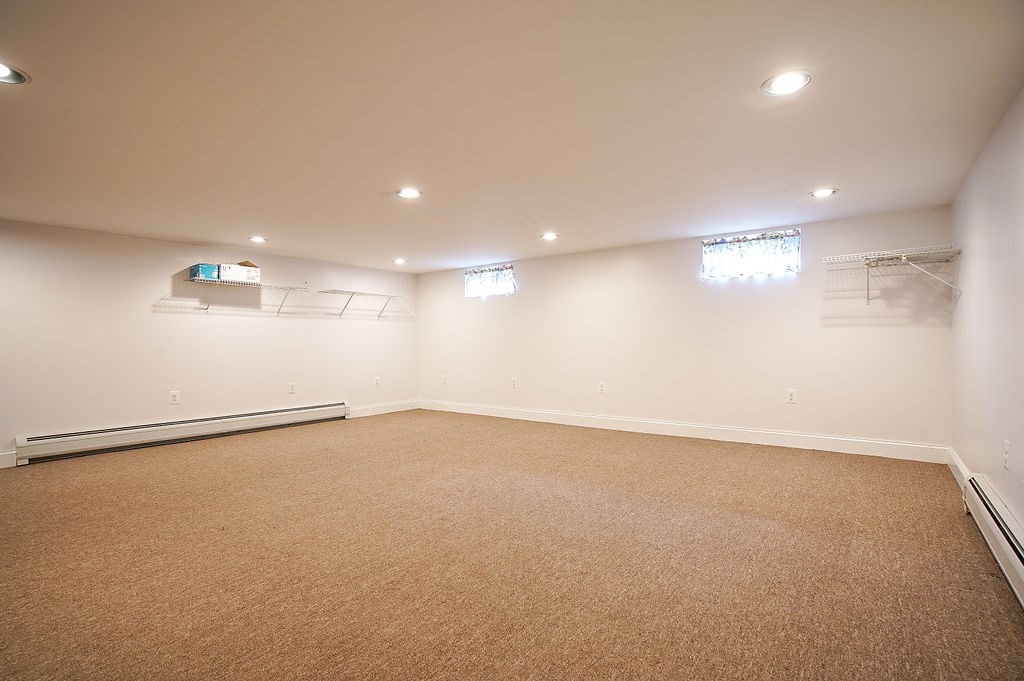 15 Holyoke Road Westfield, MA 01085 - Photo 34 of 41 an empty room with a projector and a window