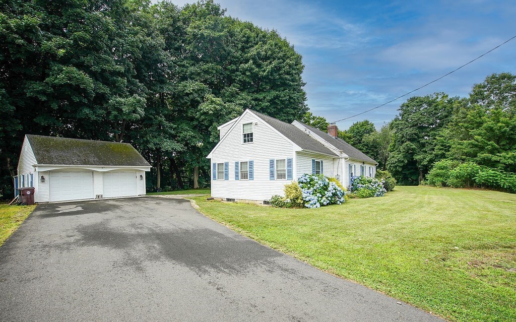 15 Holyoke Road Westfield, MA 01085 - Photo 41 of 41 a front view of a house with a garden and yard