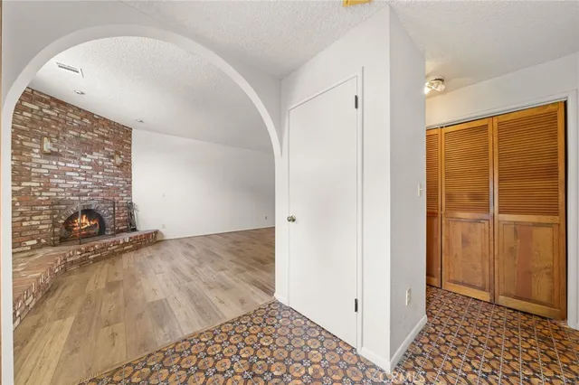 a view of empty room with windows