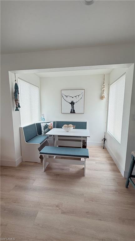 2235 San Marco Road, Unit 5204 Marco Island, FL 34145 - Photo 26 of 34 Dining nook with built-in bench seating and two large windows