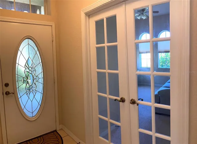 a view of livingroom with furniture and window