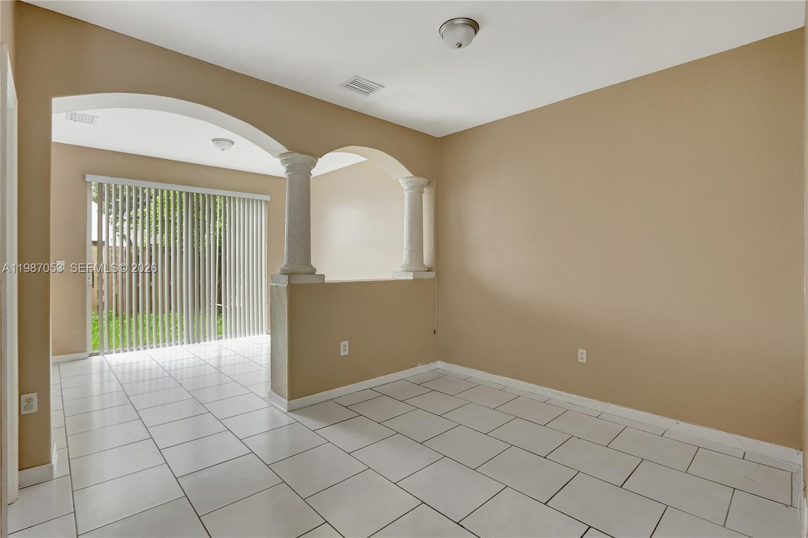 2874 Southeast 15th Road, Unit 52 Homestead, FL 33035 - Photo 5 of 16 a view of a room with white walls