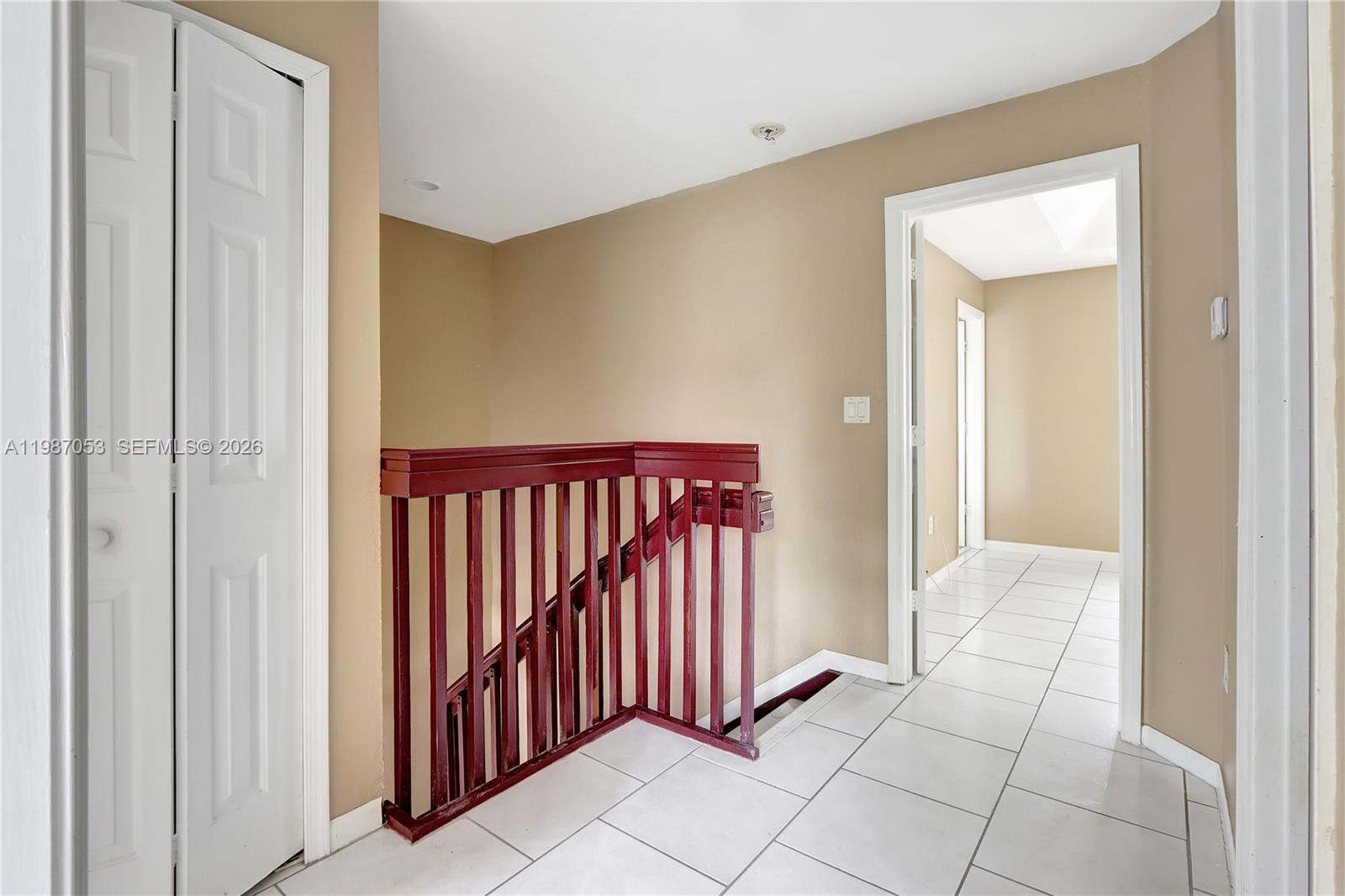 2874 Southeast 15th Road, Unit 52 Homestead, FL 33035 - Photo 10 of 16 a view of a hallway with entryway door