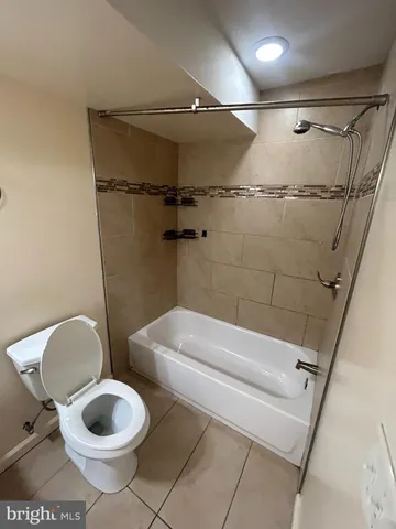 a front view of a building with windows