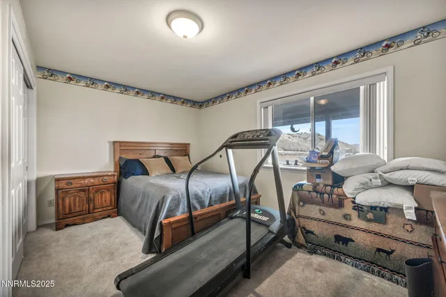 a bedroom with furniture