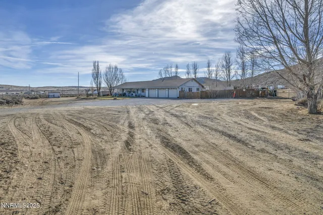 a view of a road with an ocean view