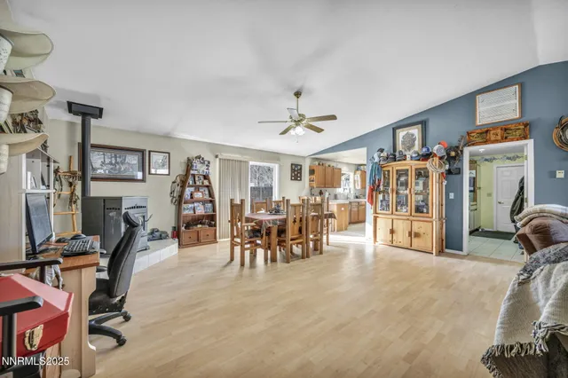 a view of a livingroom with furniture and a livingroom