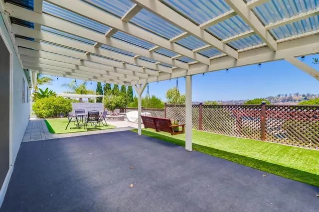 a view of a room with wooden walls