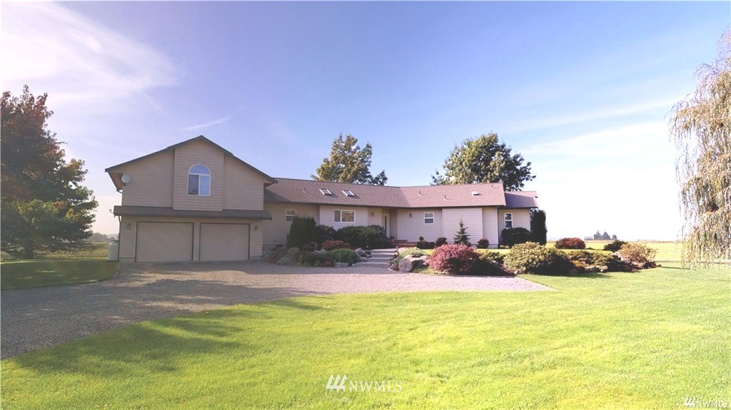 a front view of a house with patio