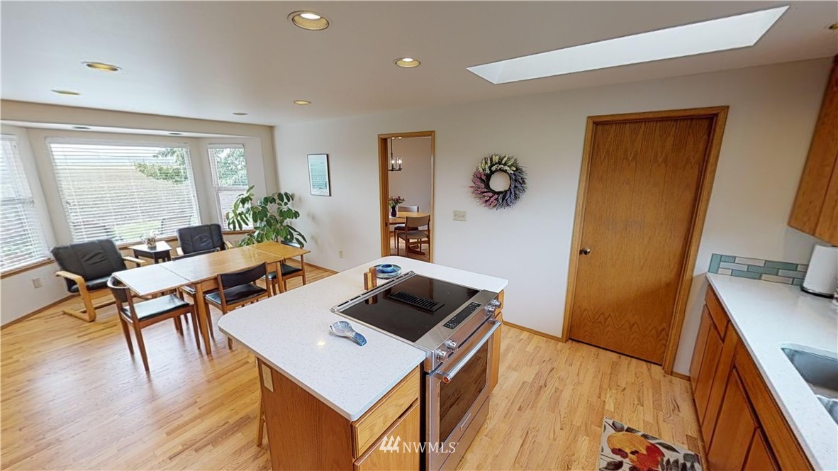 16936 Bradshaw Road Mount Vernon, WA 98273 - Photo 10 of 25 a living room with a couch and a table