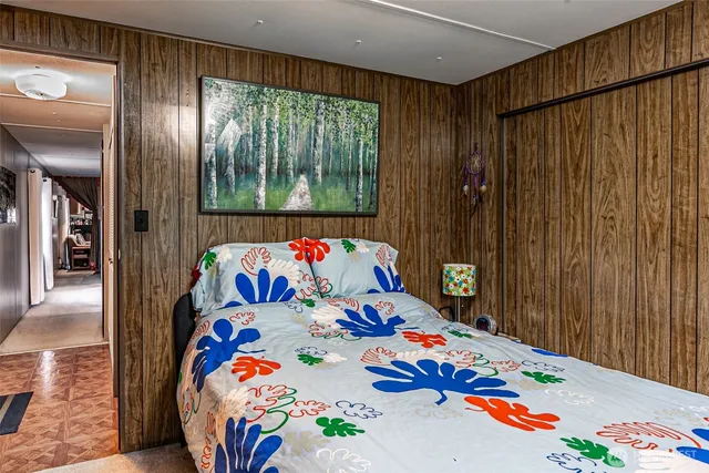 a bathroom with a shower sink and mirror