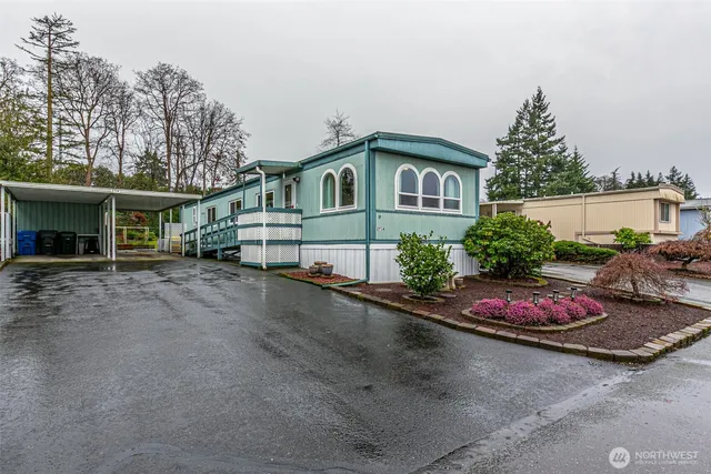 a view of a chair and tables in the garden