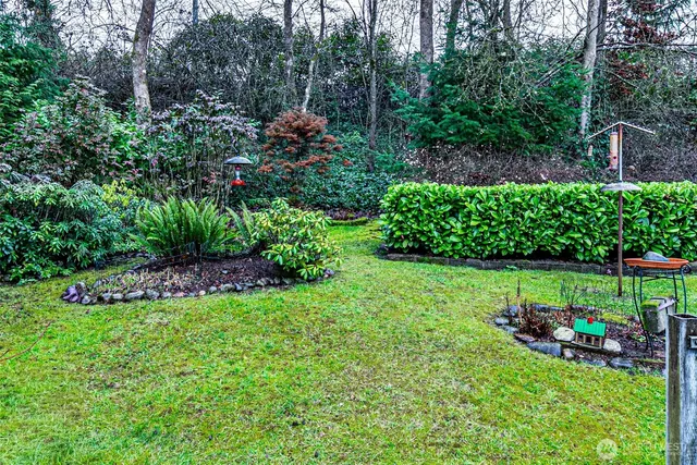 a view of a wooden floor with a yard
