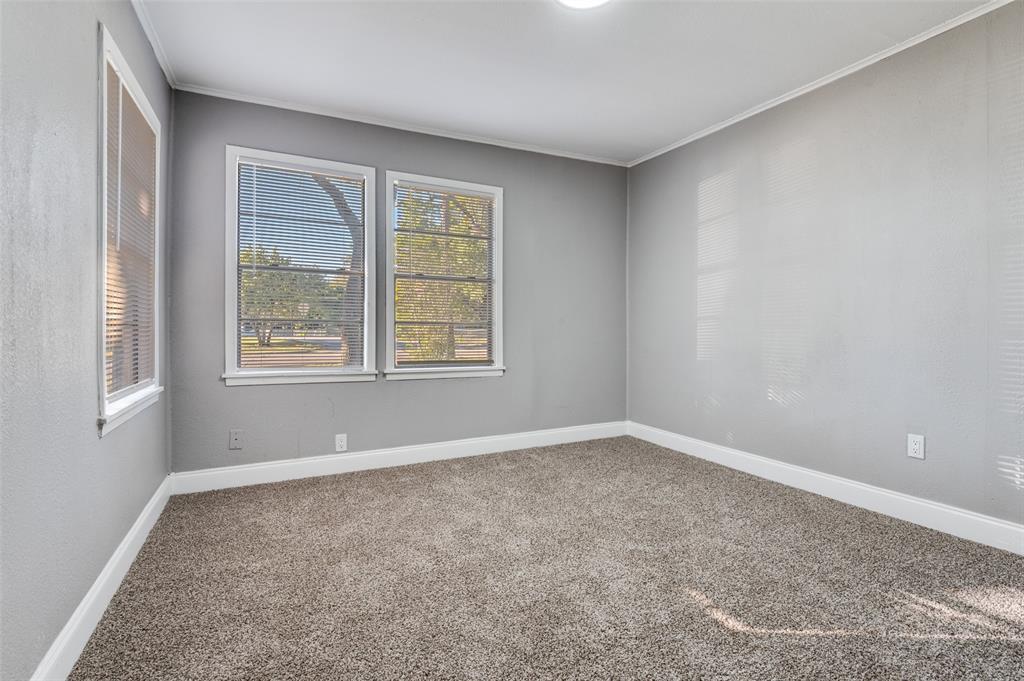 421 West 8th Street Lancaster, TX 75146 - Photo 12 of 25 an empty room with windows