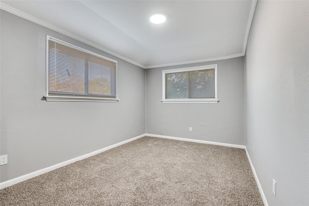 421 West 8th Street Lancaster, TX 75146 - Photo 13 of 25 an empty room with windows