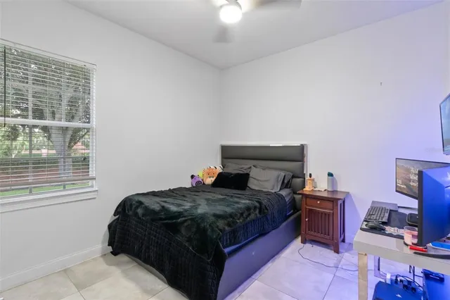 a bathroom with a sink mirror toilet and shower