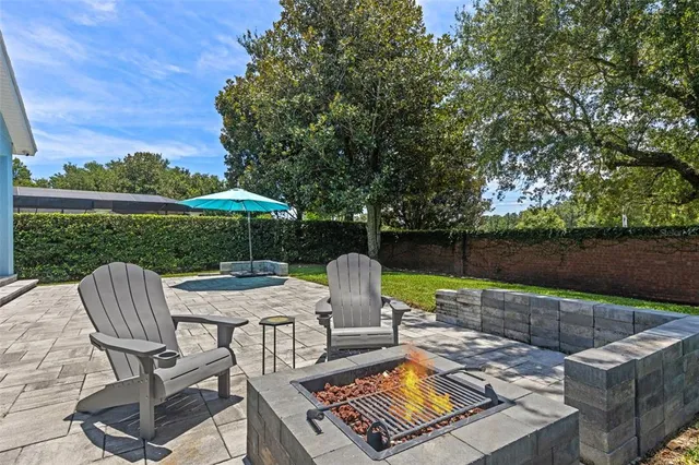a view of a table and chairs in the patio