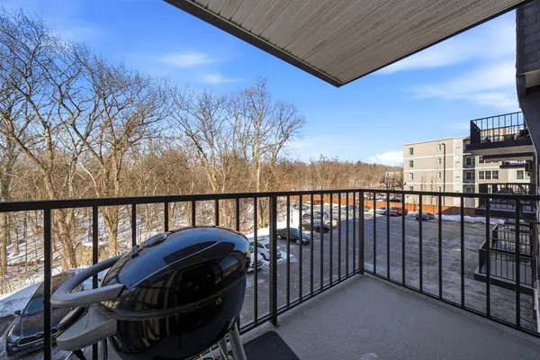 a view of balcony with furniture