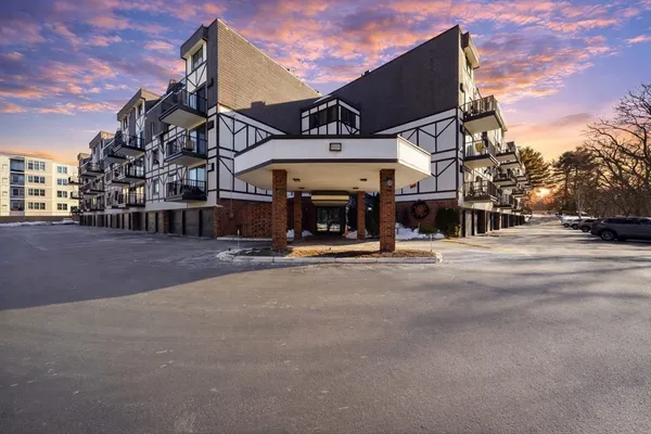 a view of a building with a street