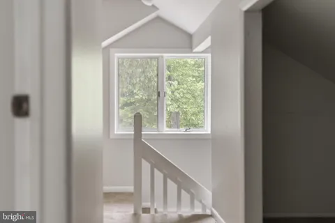 a view of a balcony with front door