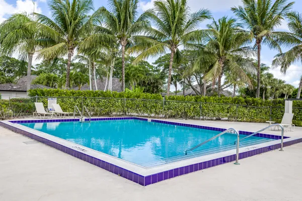 a view of swimming pool from a lake view