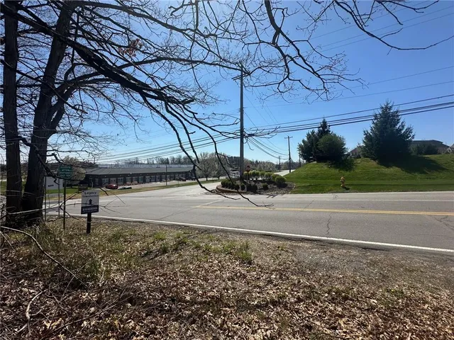 a view of road with trees