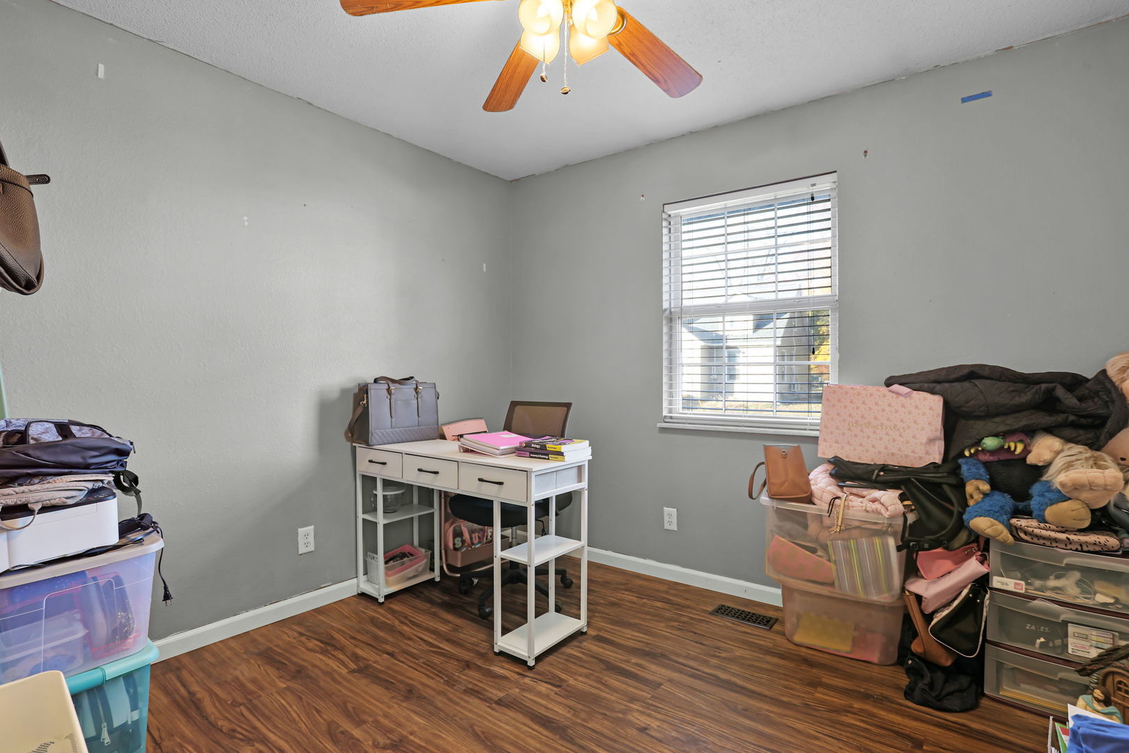 207 Byrn Street Troy, IL 62294 - Photo 13 of 19 a workspace with furniture and wooden floor