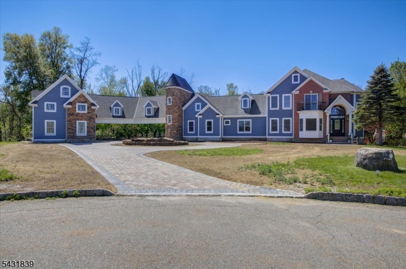 15 Spring Hunter Court Andover, NJ 07821 - Photo 1 of 49 a front view of a house with a yard and large tree