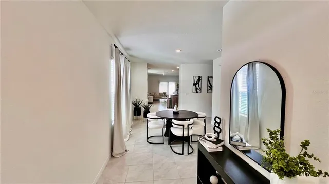 a view of a livingroom with furniture and furniture