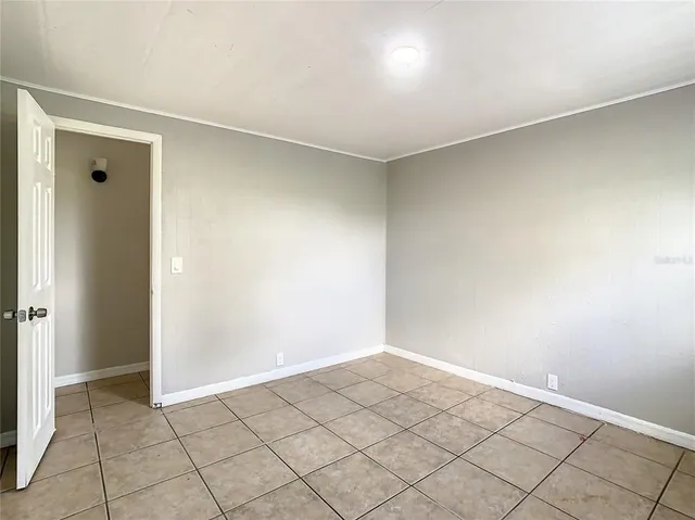 a kitchen with furniture and window