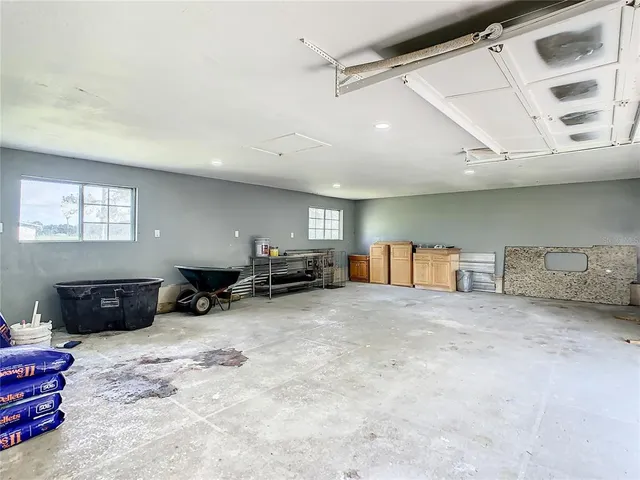 a view of a livingroom with furniture and a fireplace